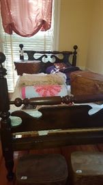 Antique blanket roll bed.