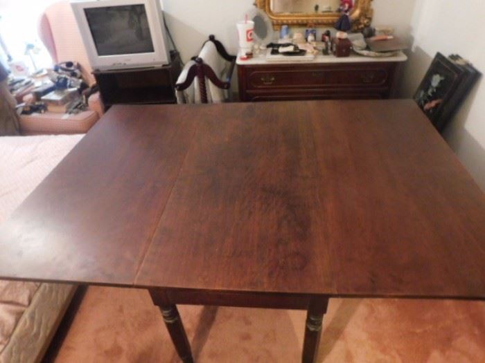 Drop leaf table extended 4 foot by 5 foot 