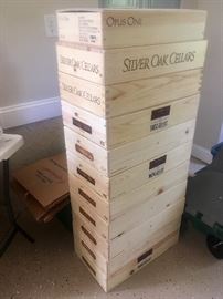 There are many wooden wine boxes & crates