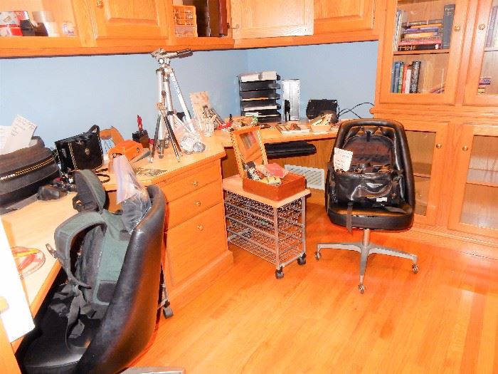 pair of office chairs, cameras, office supplies