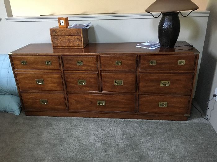Henredon "Campaign Collection". Bedroom Suite. Includes dresser, 2 bedside chests, headboard and bed frame. 