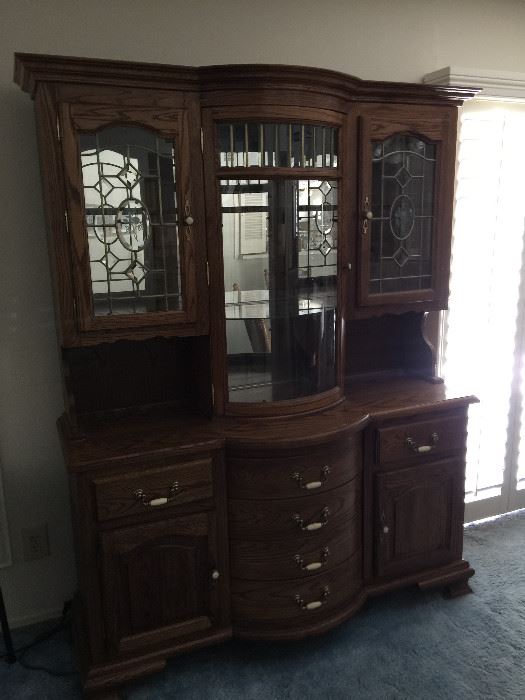 Glass top hutch with 2 cabinets on the bottom and 6 drawers     approx 58" w   18" depth  77" ht 
