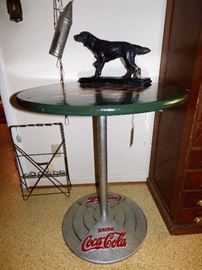 Coca Cola table, dog statue