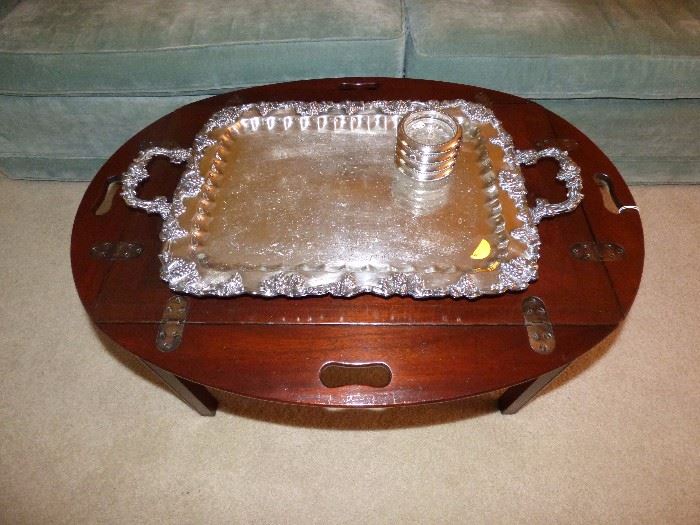 Antique silverplate serving tray on butler's table