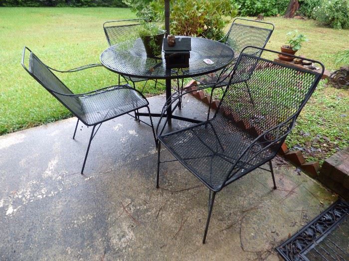 Vintage iron outdoor table with 4 arm chairs