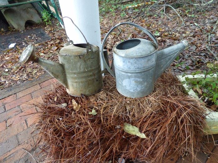 Vintage galvanized watering cans