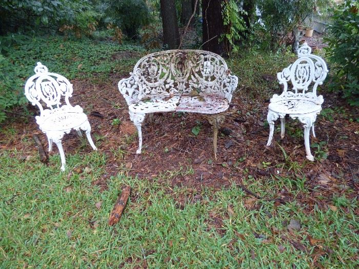 Cast iron garden bench with 2 chairs, 1 leg as is