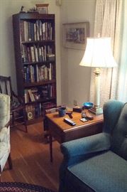 Bookcase & books, lamp, & one of a pair cherry  Pennsylvania House two drawer stands.