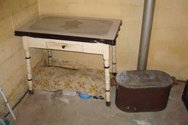 Antique decorated enamel table and copper wash boiler.