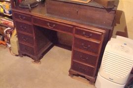 Vintage student desk and dehumidifier.