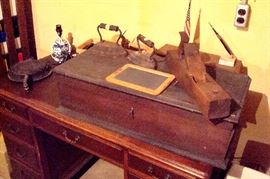 Antique chest, plane, slate, sad irons & griddle.