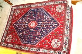 Wool hand knotted oriental rug.