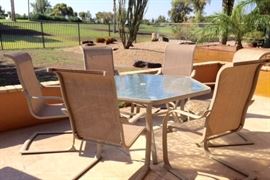 Octagonal patio table and 6 rocker arm chairs