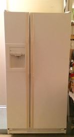 Ivory GE Profile refrigerator with water and ice dispenser