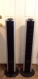 2 Bionaire oscillating floor fans with remotes