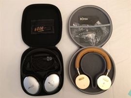 Able planet and Bohm wireless headphones in their cases