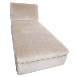 Contemporary Upholstered Chaise Lounge: A contemporary chaise lounge. The chaise lounge features clean, straight lines, and is fully padded and upholstered in a light tan chenille fabric. The underside is labeled “D. Langston Furniture Makers Custom Upholsterers – Denver Colorado”.