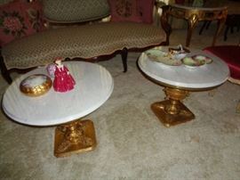 pair of these marble topped tables