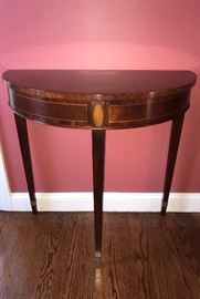 Baker Furniture - demi- lune with marquetry detail.