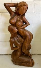 3.5 feet tall - 50-60 lbs art deco - carved from one piece of wood