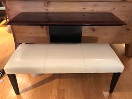 Crate and Barrel leather bench in front of console table