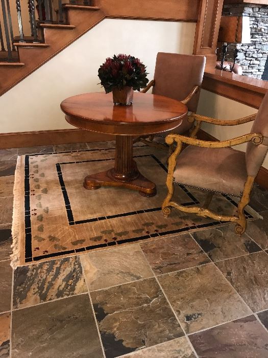 Baker Milling Road Table, Pande Cameron rug and Maitland and Smith armchairs