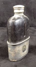Vintage leather and silver wrapped flask