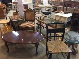 coffee table and assorted chairs, blanket rack, magazine rack, wicker hampter