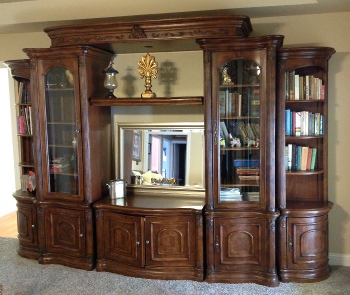 5- Piece Sectional Wall Entertainment/Curio Cabinet/  Bookcase Collection. Put all sections together as a group and you have a complete wall unit, or separate and place individual or double pieces together for a totally different look. 