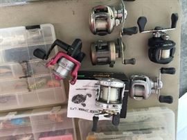 An assortment of fishing reels.