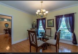 Furniture for the entire house. Everything matches in this home, from the living room to dining room to kitchen. Above features pedestal table with round beveled glass top. Chairs match dining room and feature oversized seat cushions.