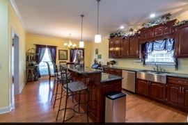 Beautiful kitchen, two padded wrought iron bar stools at breakfast area. Like new!
