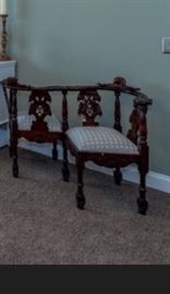 Gossip, conversation, or courting seat. Great conversational piece for any room.