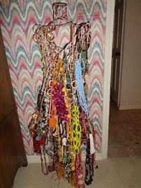 this is a dress form loaded w/jewelry