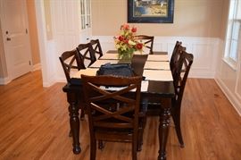 Ashley Porter Dark All Wood Dining Table with Removable Leaf and 8 Chairs 70" X 42" Wide X 30" Tall Plus 18" Leaf Extension
