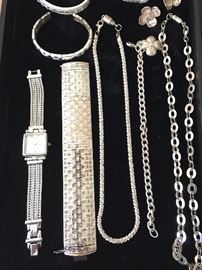 Sterling jewelry including Tiffany bracelet with Dogwood charm.