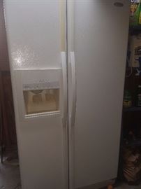 Whirlpool white side-by-side refrigerator