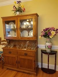 China cabinet/hutch, China, & cut glass, vases with flowers, small table, & more.