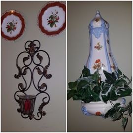 Wall decor including plates, wire votive candle holder, & more.