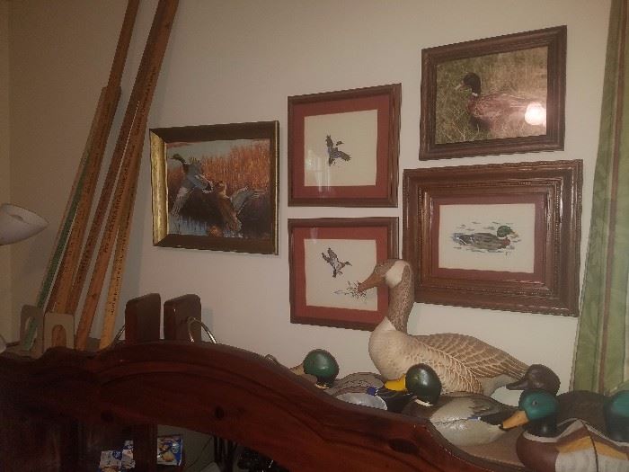 Cross stitched ducks, wooden ducks, bookends, advertising yard sticks, & more. 