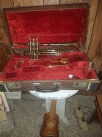 Vintage Trumpet & decorative small guitar.