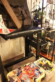 Spanking bench, very sturdy, made from welded steel and padded for comfort.