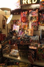 Lots of toys and action figures, including Simpsons, Futurama, The Tick, Pee Wee Herman, Aliens, Predator, Spawn, Terminator, Toy Story, etc.