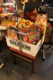 Lots of toys and action figures, including Simpsons, Futurama, The Tick, Pee Wee Herman, Aliens, Predator, Spawn, Terminator, Toy Story, etc.