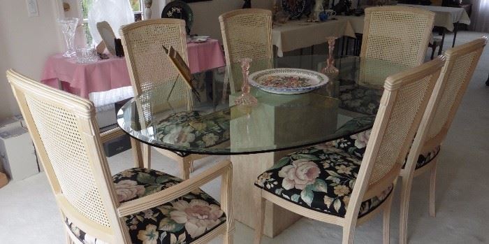 Oval glass top table on stand