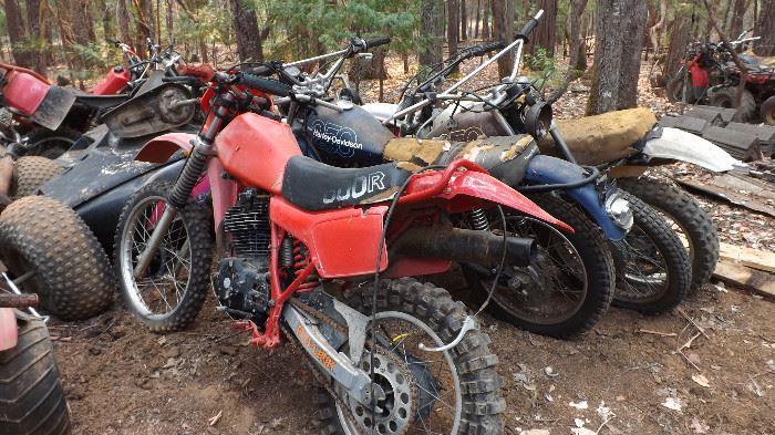 the Bone Yard: Dirt Bikes ATVs couple snowmobiles