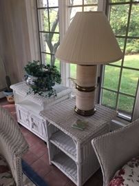 White rattan side tables, lamp and plants