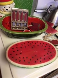 Watermelon candle, bowl, spreaders, and other decor