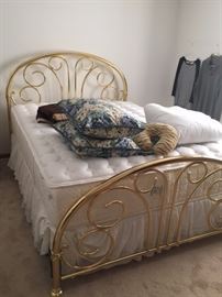Queen size brass bed with Vera Wang pillowtop mattress
