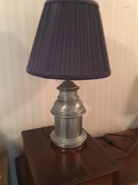 Table lamp with silver tone and blue shade